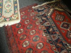 THREE SMALL RUGS including Afghan Teke rug, largest 234 x 120cms