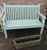 GREEN SLATTED GARDEN BENCH, makers label behind, 1 meter 20cms, and an Art Nouveau style stone