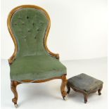 VICTORIAN WALNUT BUTTON BACK NURSING CHAIR, cabriole legs, ceramic casters and small foot stool (2)