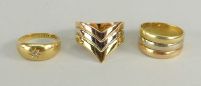 THREE 18CT GOLD RINGS, one diamond chip set, one herringbone design, the other of banded design,