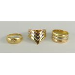 THREE 18CT GOLD RINGS, one diamond chip set, one herringbone design, the other of banded design,