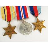 WWII MEDAL TRIO COMPRISING 1939-45 War medal, Africa Star and 39-45 Star in box marked G H Wells