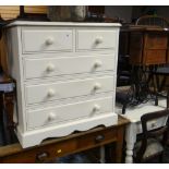 TWO ITEMS OF PAINTED FURNITURE being a small five drawer chest and two drawer writing or dressing
