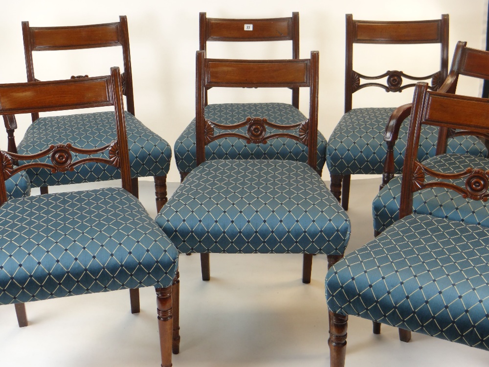 SET OF EIGHT REGENCY MAHOGANY DINING CHAIRS, bowed tablet backs, scrolled cross bars, tapering