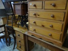SMALL PINE FIVE DRAWER CHEST and pine writing table with three drawers to the side (2)