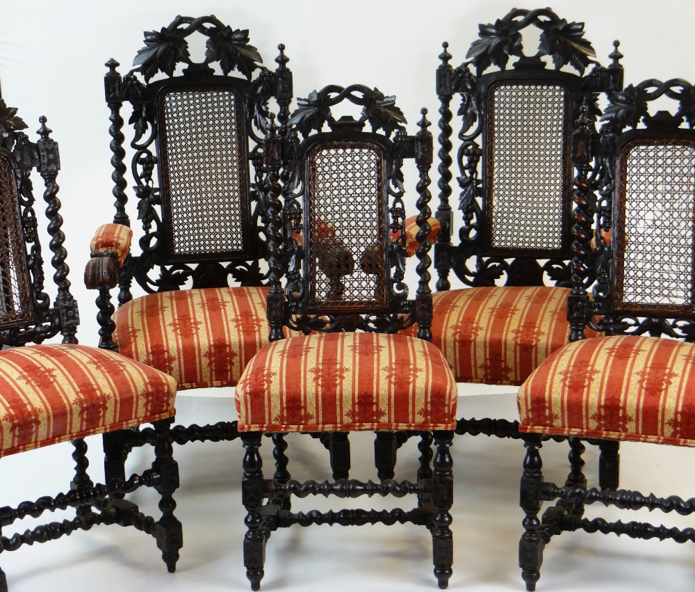 SET OF EIGHT CAROLEAN STYLE CARVED OAK & CANED DINING CHAIRS, including two armchairs