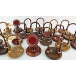 ASSORTED CARVED HARDWOOD WATCH STANDS WITH METAL MOUNTS including rosewood, ETC (approx. 23)