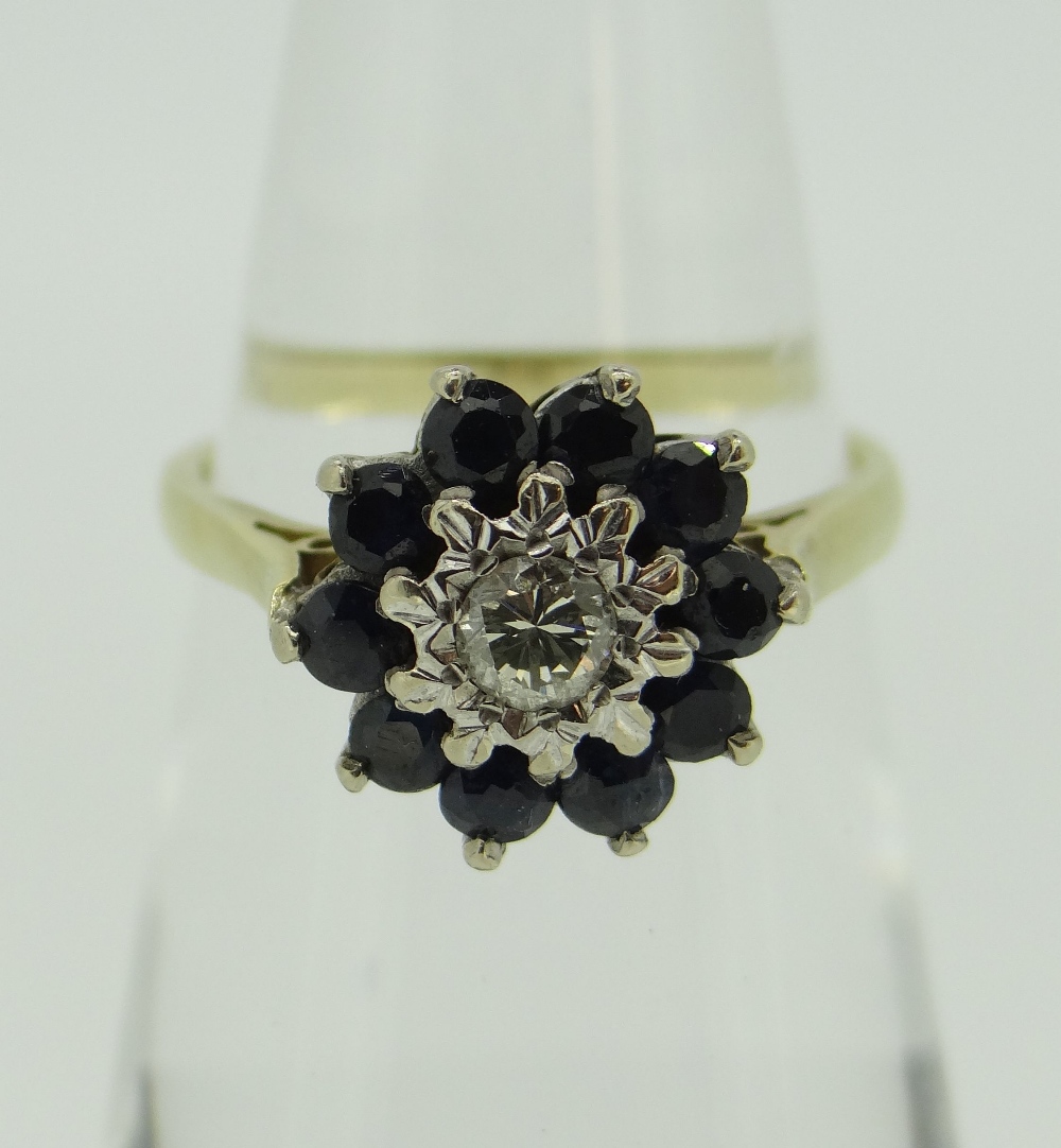 18CT GOLD DIAMOND & SAPPHIRE FLOWER CLUSTER RING, 3.5gms.