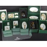 ELEVEN SWAROVSKI CRYSTAL 'MEMORIES GOLD SPORT' ORNAMENTS WITH MIRROR, BOXED (11)