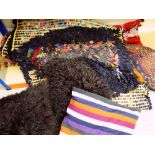 ASSORTED TEXTILES including two rag rugs, two flat weaves, four cushions and camel bag face