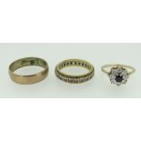 THREE 18CT YELLOW GOLD RINGS comprising diamond chip eternity ring, diamond and ruby set ring and