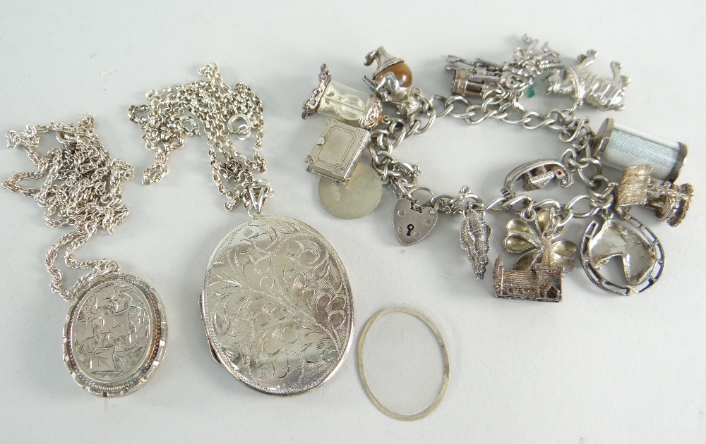 ASSORTED SILVER JEWELLERY to include silver charm bracelet and two silver lockets on chains (3)