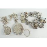 ASSORTED SILVER JEWELLERY to include silver charm bracelet and two silver lockets on chains (3)