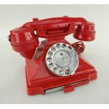 G.P.O 232 SERIES RED BAKELITE TELEPHONE CIRCA 1962, braided cord, alphabet dial, exchange drawer,