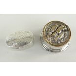 SMALL SILVER OVAL SCROLL ENGRAVED BOX WITH HINGED COVER, together with circular silver small box and