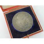 QUEEN VICTORIA CASED SILVER DIAMOND JUBILEE MEDALLION in original red Morocco box dated 1837-1897.