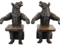 PAIR OF MID-TWENTIETH CENTURY CARVED WOODEN BLACK FOREST-STYLE BEAR CHAIRS modelled as bears