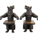 PAIR OF MID-TWENTIETH CENTURY CARVED WOODEN BLACK FOREST-STYLE BEAR CHAIRS modelled as bears