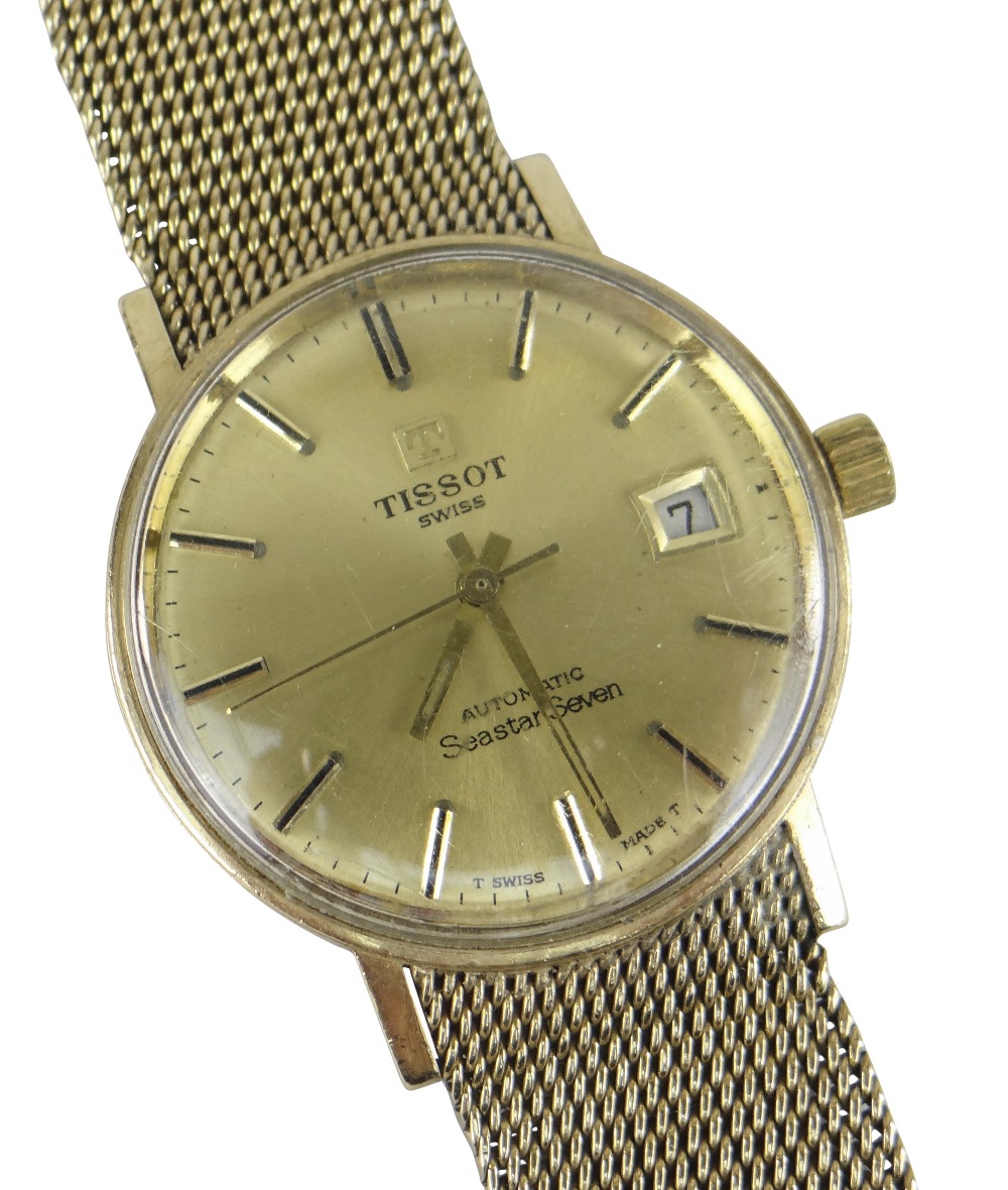 TISSOT AUTOMATIC 'SEASTAR SEVEN' 9CT GOLD WRISTWATCH having integrated 9ct gold strap and date