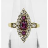 18CT YELLOW GOLD MARQUISE RUBY & DIAMOND CLUSTER RING, the central ruby (5.5 x 4.5mms) flanked by