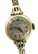 18CT YELLOW GOLD LADIES ROLEX PRECISION WRISTWATCH, the inside cover marked 'R. W. Co Ltd' and