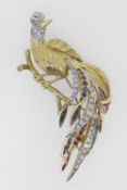 18CT YELLOW GOLD BROOCH IN THE FORM OF A PEACOCK ON BRANCH set with diamonds, sapphires, rubies