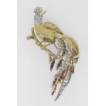 18CT YELLOW GOLD BROOCH IN THE FORM OF A PEACOCK ON BRANCH set with diamonds, sapphires, rubies