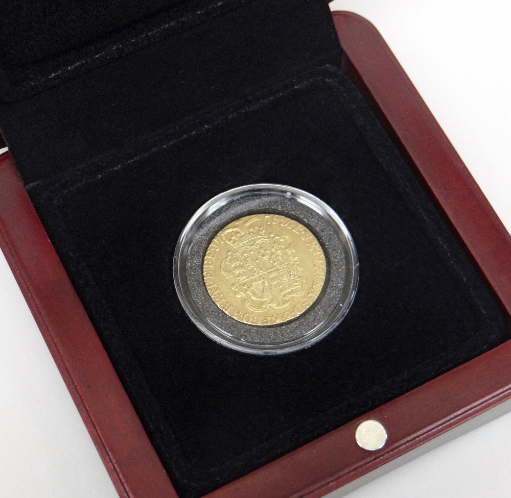 GEORGE III GOLD 'ROSE' GUINEA DATED 1779 IN PRESENTATION BOX Condition Report: In good overall