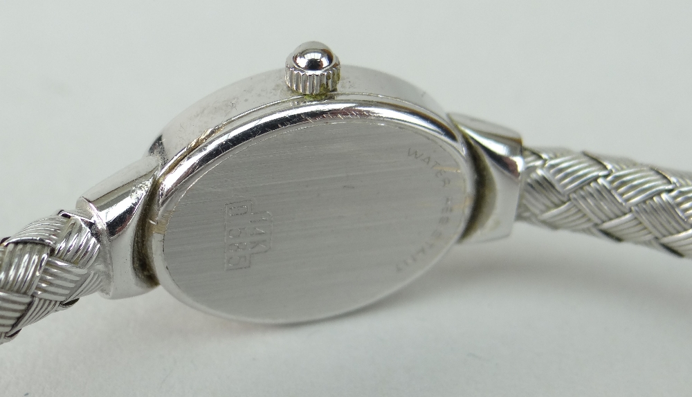 14K WHITE GOLD LADIES VICENCE WRISTWATCH HAVING OVAL DIAL and integrated 14k white gold bracelet. - Image 4 of 5
