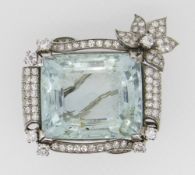 LARGE BELIEVED AQUAMARINE (2.8 X 2.4CMS) BAR BROOCH having diamond scroll and flower head border