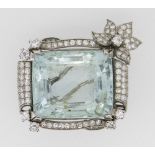 LARGE BELIEVED AQUAMARINE (2.8 X 2.4CMS) BAR BROOCH having diamond scroll and flower head border