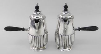 A PAIR OF LATE VICTORIAN SILVER CHOCOLATE POTS, Sheffield 1887, by Howell & James Limited, half