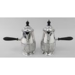 A PAIR OF LATE VICTORIAN SILVER CHOCOLATE POTS, Sheffield 1887, by Howell & James Limited, half