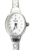 14K WHITE GOLD LADIES VICENCE WRISTWATCH HAVING OVAL DIAL and integrated 14k white gold bracelet.