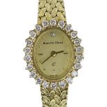 9CT YELLOW GOLD LADIES BUECHE-GIROD COCKTAIL WATCH, the oval dial surrounded by twenty-two