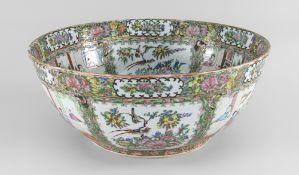 A CANTON FAMILLE ROSE PORCELAIN PUNCH BOWL, 19th Century, decorated to the inside and outside with