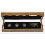 THE 2011 ROYAL COURTSHIP PURE GOLD COIN SET comprising three 24ct gold Crowns and 24ct gold