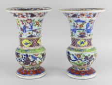 PAIR OF CHINESE BLUE & WHITE AND CLOBBERED PORCELAIN TRUMPET VASES 19th Century, decorated with