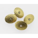 PAIR OF 18CT YELLOW GOLD AND DIAMOND CUFFLINKS of hammered design, 17.7 grams overall. Condition