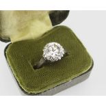 PLATINUM DIAMOND SOLITAIRE DRESS RING HAVING PIERCED RHOMBUS AND CLAW DESIGN SETTING, 3.8cts