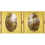 PAIR OF ROYAL WORCESTER JAMES STINTON DECORATED PLAQUES of oval form, opposing images of pheasants