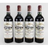 4 BOTTLES OF CHATEAU CHASSE-SPLEEN 1986 (4) Condition Report: labels appear to be damp damaged