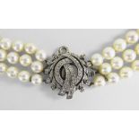 9CT WHITE GOLD & DIAMOND CLASP THREE-STRAND GRADUATED PEARL NECKLACE, in box Condition Report: