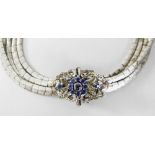 18CT WHITE GOLD & SAPPHIRE FIVE STRAND NECKLACE of rectangular block design having flower head