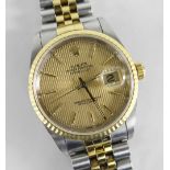 ROLEX OYSTER PERPETUAL DATEJUST SUPERLATIVE CHRONOMETER WRISTWATCH, having baton hands and numerals,