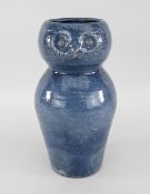 EWENNY POTTERY OWL JUG in mottled blue glaze, gourd shape with loop handle, the upper section in the