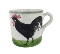 A LLANELLY POTTERY MUG painted with single black cock strutting on grass, stencilled LLANELLY to