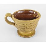 EWENNY POTTERY SHAVING MUG of circular footed form with loop handle and half-shelf interior,