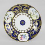 A SWANSEA PORCELAIN PLATE attributed to William Pollard, painted with three panels of birds on