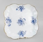 NANTGARW PORCELAIN LOBED SQUARE DISH painted in blue with sprays of flowers and with gilt rim,